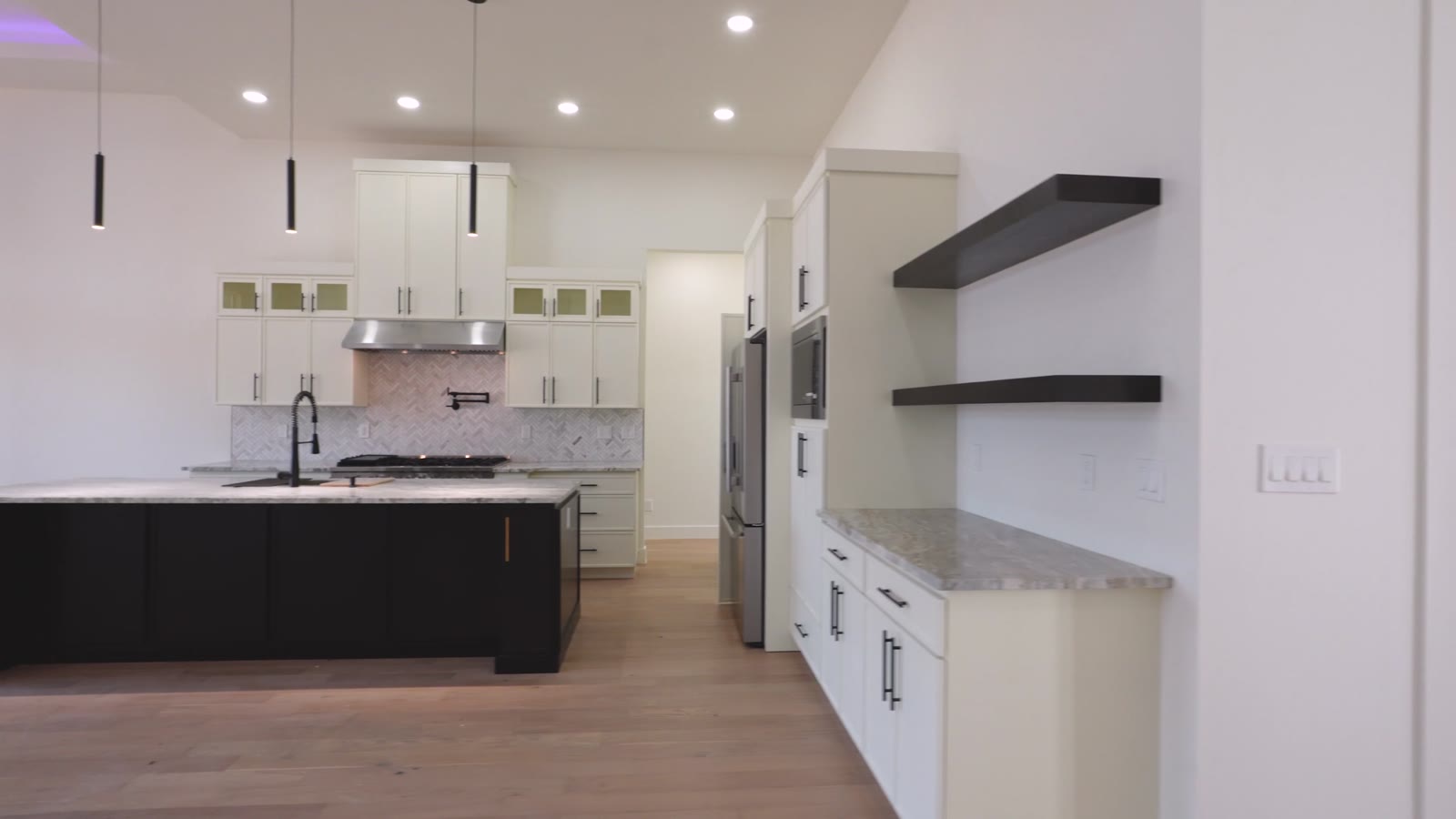 Montecito modern kitchen with black island