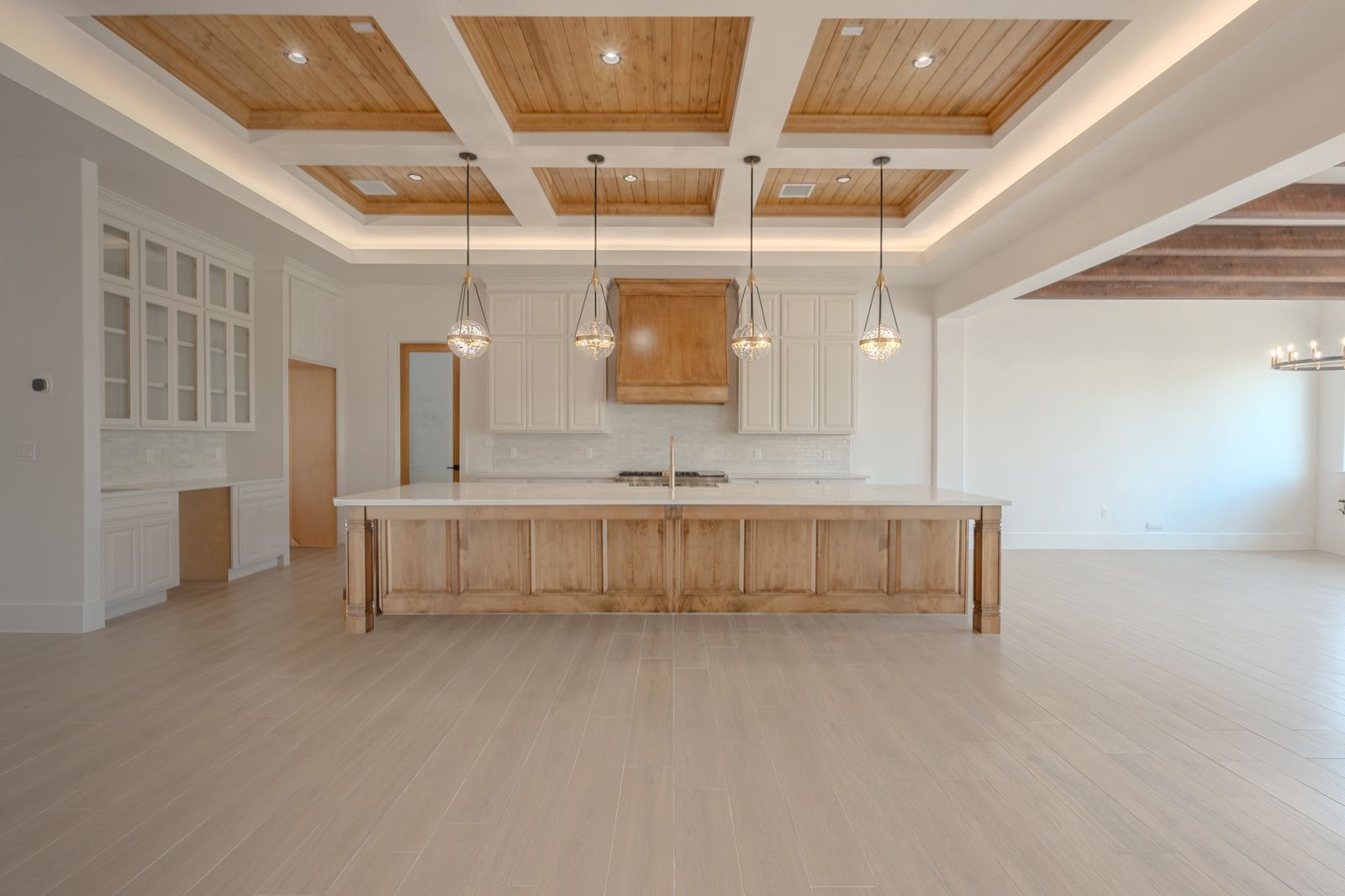Pointe Homes kitchen with coffered wood ceiling